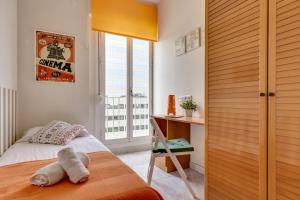 Posteľ alebo postele v izbe v ubytovaní Apartment Link BCN Sants