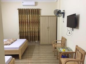 TV a/nebo společenská místnost v ubytování Việt Dũng Motel