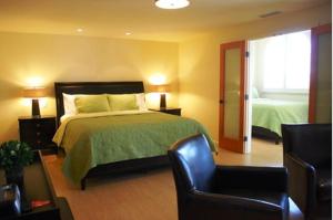 Postel nebo postele na pokoji v ubytování Bella Capri Inn and Suites