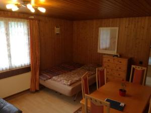 Postel nebo postele na pokoji v ubytování Apartmenthaus Kreuzbuche