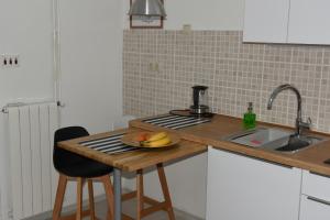 Kuchyňa alebo kuchynka v ubytovaní Jazzy Apartment Zagreb