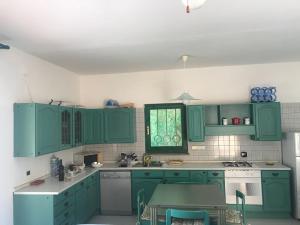 Кухня или мини-кухня в Casa La Pelosa Beach
