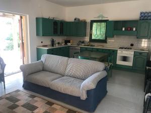 Кухня или мини-кухня в Casa La Pelosa Beach
