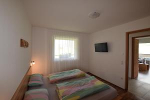 Postel nebo postele na pokoji v ubytování Garnhof