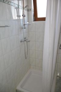 Koupelna v ubytování Apartments Lans