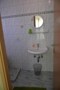 Koupelna v ubytování Apartments Lans