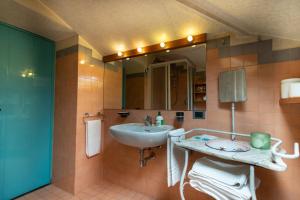 Koupelna v ubytování Attico di charme + 22 fotografií