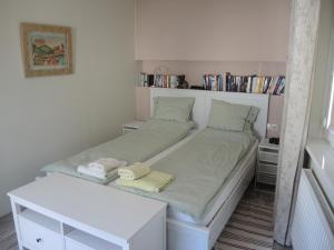 Posteľ alebo postele v izbe v ubytovaní Apartament Babitonga I