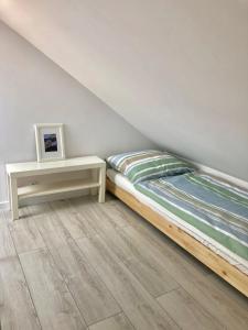 Postel nebo postele na pokoji v ubytování Apartament Julia