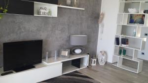 TV a/nebo společenská místnost v ubytování Villa Cecilia