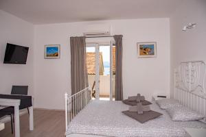 Postel nebo postele na pokoji v ubytování Sea Pearl Residence - Top beachfront location apartments in Bol centre
