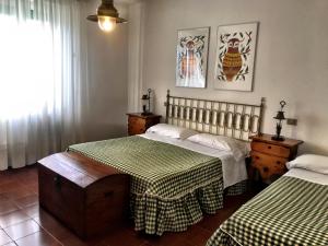 Ένα ή περισσότερα κρεβάτια σε δωμάτιο στο Casa Asia