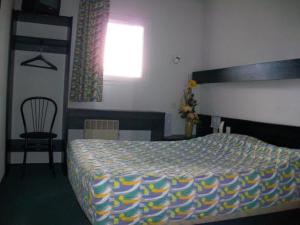 Cama o camas de una habitación en Hotel Le Chavanon