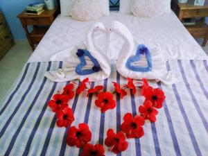 Ένα ή περισσότερα κρεβάτια σε δωμάτιο στο Paradisso Studios