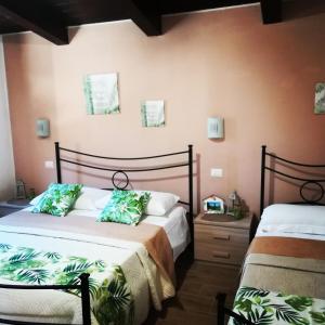 Giường trong phòng chung tại Agriturismo Santa Maria