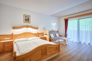 Posteľ alebo postele v izbe v ubytovaní Alpenhotel Schönwald Superior