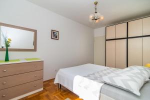 Posteľ alebo postele v izbe v ubytovaní Apartment Vesna Kandlerova