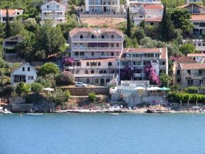 a view of a resort from the water at Apartments Sofija in Tivat