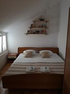 Ένα ή περισσότερα κρεβάτια σε δωμάτιο στο Apartment Sea San