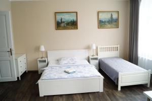 Postel nebo postele na pokoji v ubytování Apartmány Mary