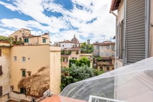 a view of the city from a balcony at Cavourotto Terrace by Mmega in Florence
