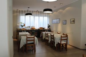 ห้องอาหารหรือที่รับประทานอาหารของ Hotel Il Grappolo D'Oro