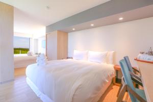 Llit o llits en una habitació de Laguna Villas & Resorts