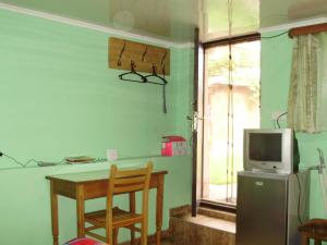 TV o dispositivi per l'intrattenimento presso Apartment On Erekle 25a