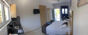 Katil atau katil-katil dalam bilik di Poseidon Suites Hotel +110 gambar