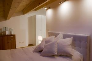 Postel nebo postele na pokoji v ubytování White albergo diffuso Ristorante & SPA