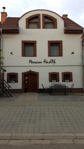 a building with a sign that reads passion helix at Penzion Hádlík in Velké Pavlovice