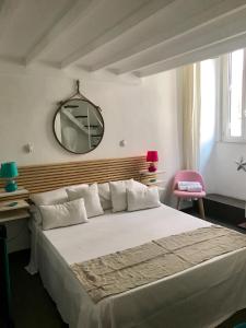 Trastevere Star tesisinde bir odada yatak veya yataklar