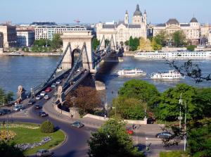 a view of a bridge over a river with cars at Supreme City Center Apartment in Budapest