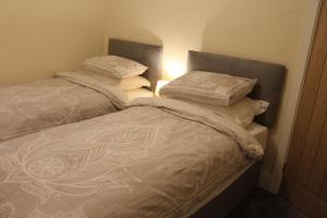 Postel nebo postele na pokoji v ubytování Van Apartments