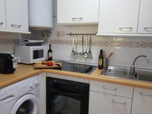 A kitchen or kitchenette at Apartamento Auténtico Playa