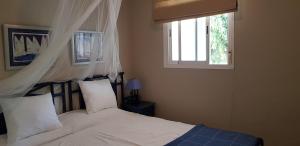 A bed or beds in a room at Apartamento Auténtico Playa