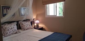 A bed or beds in a room at Apartamento Auténtico Playa
