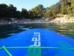 a view of the back of a boat in the water at Apartments Nicole in Pula
