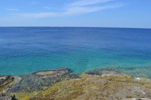 an aerial view of the ocean with blue water at Apartments Nicole in Pula