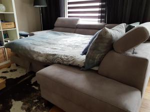 Postel nebo postele na pokoji v ubytování Bluebeach Scheveningen