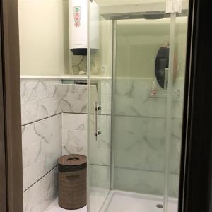 Ванная комната в Vernissage Apartment