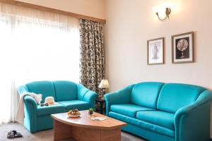 Lotus Family Hotel - Free Parking的休息区