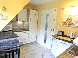 Köök või kööginurk majutusasutuses Peedy's luxuriöse 60m² Wohnung mit Balkonterrasse