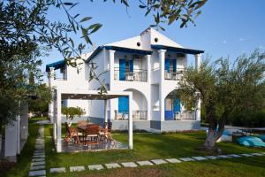 Zahrada ubytování Sun 'n Chill, Boutique Apartments & Beach Villa