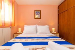 Postel nebo postele na pokoji v ubytování Holiday home Ana