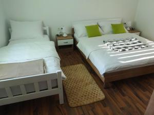 Postel nebo postele na pokoji v ubytování Apartman Sara vl. Franjo Klasić