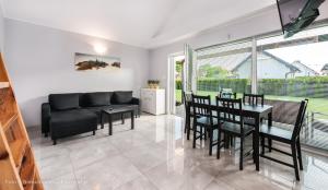 Posezení v ubytování Domki Letniskowe Dunaj