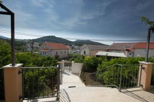 a view from the balcony of a house at Apartman Toni in Lukoran