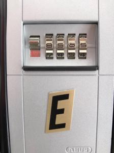 a metal refrigerator with the letter e on it at Port 27 in Empuriabrava