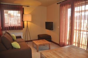 TV a/nebo společenská místnost v ubytování Apartaments Turístics Puigcerdà - La Closa